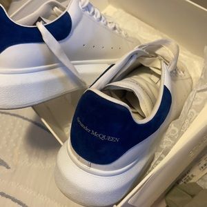 Used, Authentic. Alexander McQueens blue backing. Comes with box. Extra laces